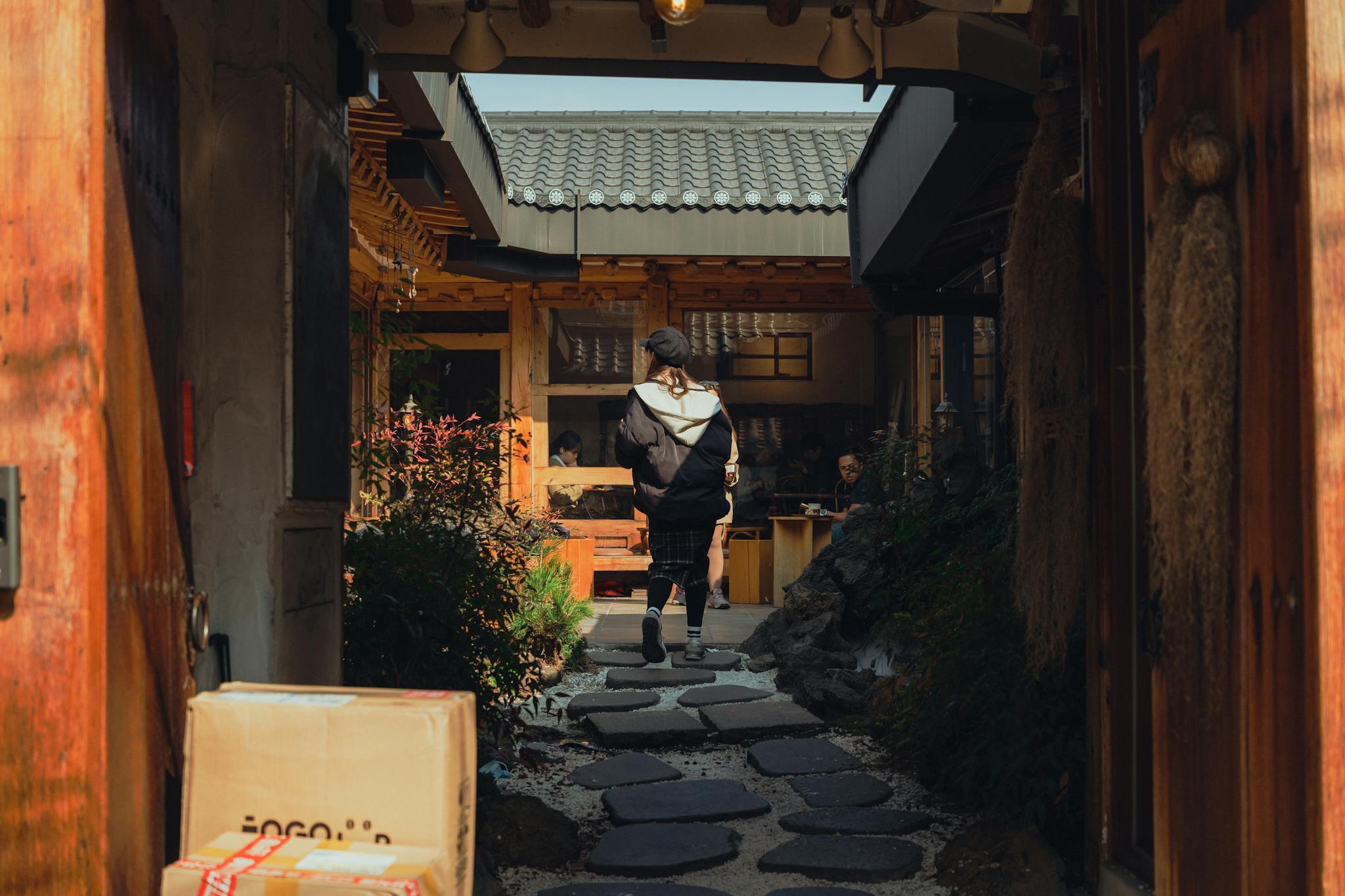 Explore a cozy alleyway in Seoul, South Korea with traditional architecture and serene ambiance.
